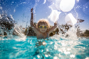 child-playing-in-swimming-pool-2021-08-31-22-17-42-utc